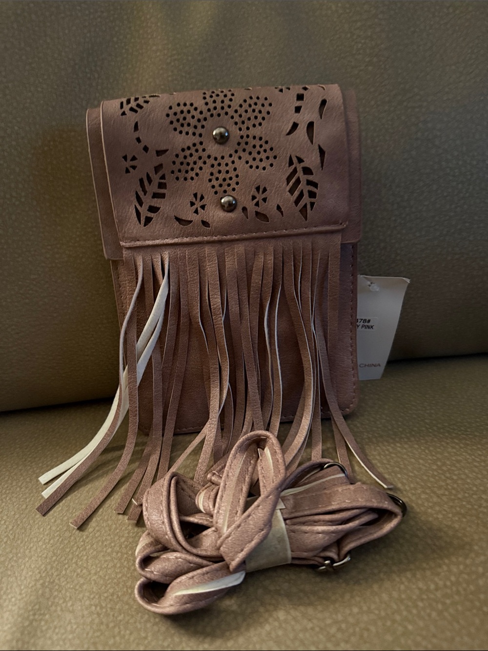 Fringed Laser-Cut Crossbody Bag in Dusty Pink